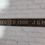 Re-set of the original Capstone at the entry to the Wire